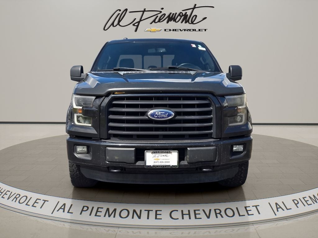 Used 2015 Ford F-150 XLT with VIN 1FTEW1EG8FFA98667 for sale in East Dundee, IL