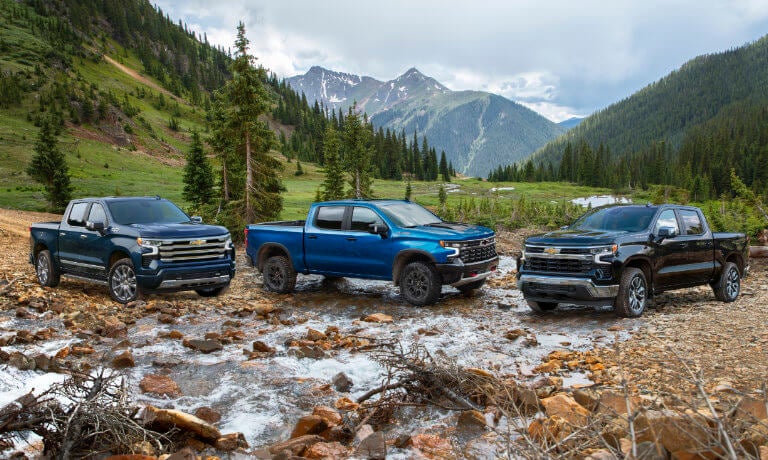 2025 Chevy Silverado 1500 lineup in the mountains